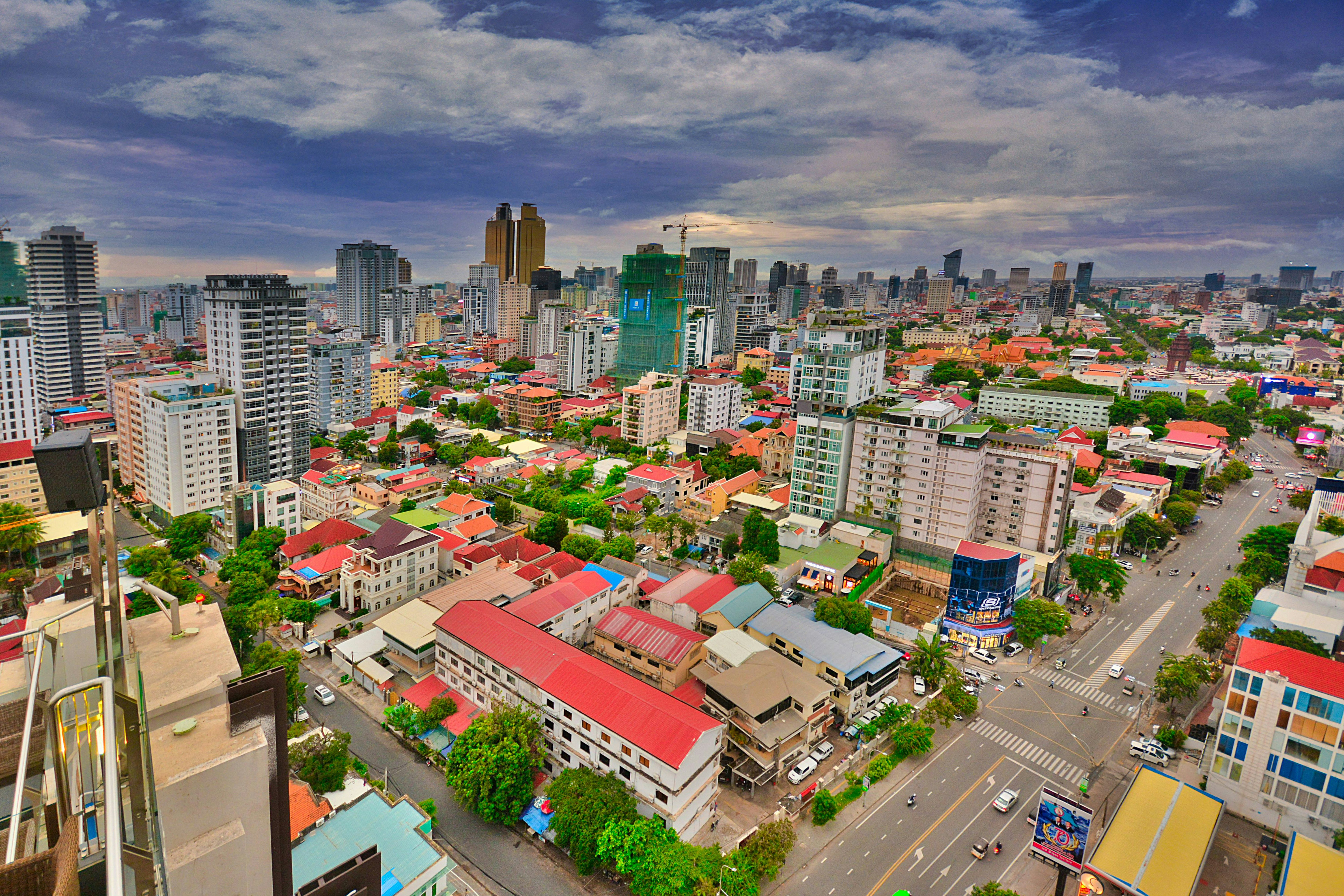 An aerial photo of a medium density urban landscape with vibrate colored buildings.